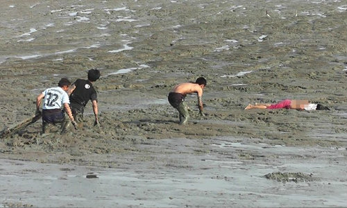 สาวนิรนามนอนเป็นศพกลางหาดเลน กู้ภัยทุลักทุเล